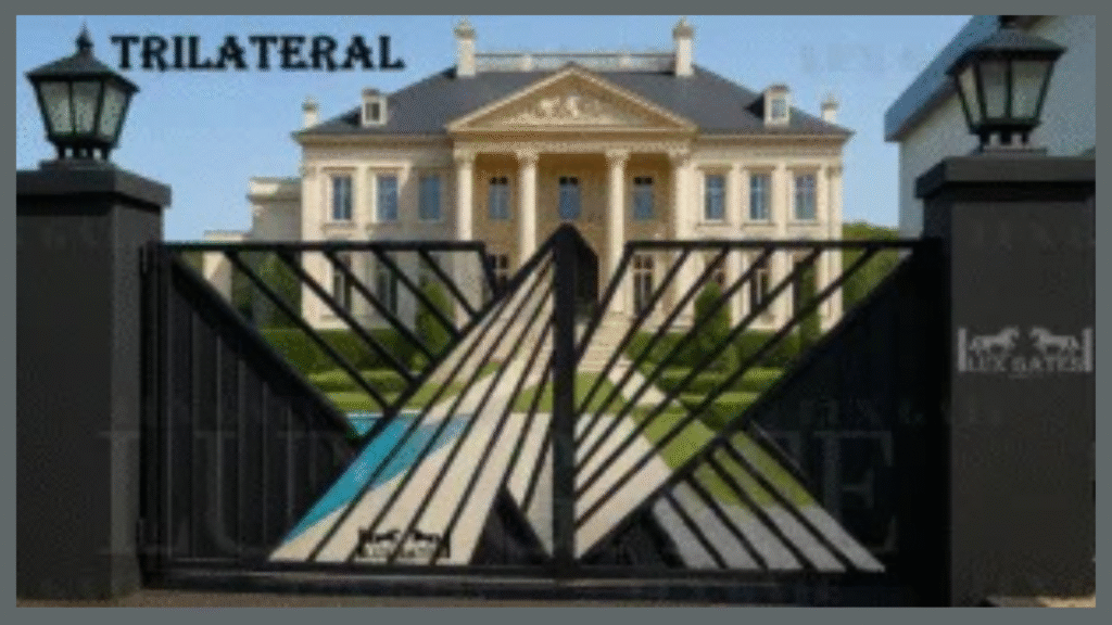 Top Custom Gate Styles Trending Across Alberta in 2026 "Modern black metal custom gate with a geometric trilateral design, positioned in front of a large luxury mansion with stone pillars and lantern-style lights.