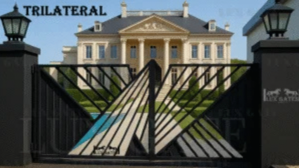 Trilateral aluminum driveway gate at a luxury home.