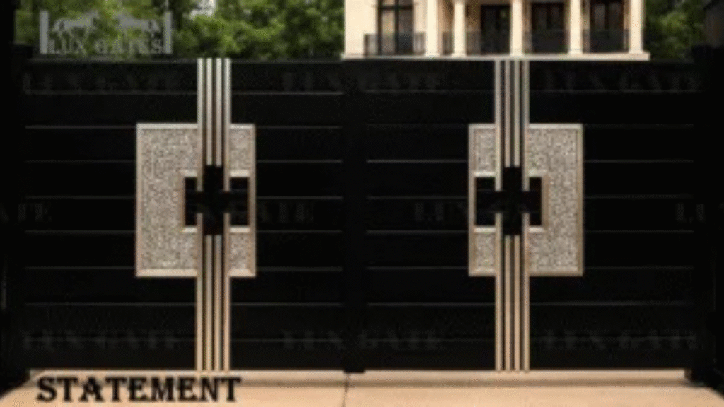 Modern black double driveway gate with decorative metal detailing.